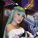Asian cosplayer Linda Le cosplays Morrigan Aensland from the video game Darkstalkers at the 2010 San Diego Comic-Con.