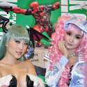 Popular Asian cosplayers Linda Le and Alodia Gosiengfiao pose for the cameras at the 2010 San Diego Comic-Con. Linda cosplays Morrigan Aensland from the video game Darkstalkers. Alodia cosplays Miwako Sakurada from the anime series Paradise Kiss.