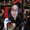 Filipina cosplayer Jan Illenberger cosplays Bayonetta from the video game Bayonetta at the 2010 San Diego Comic-Con.