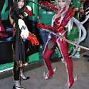 Popular Filipina cosplayers Jan Illenberger and Alodia Gosiengfiao pose for the cameras at the 2010 San Diego Comic Con. Jan cosplays Bayonetta from the video game Bayonetta. Alodia cosplays Amaha Masane from the anime series Witchblade.