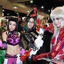 Popular Asian cosplayers Linda Le, Jan Illenberger, and Alodia Gosiengfiao pose for the cameras at the 2010 San Diego Comic-Con. Linda cosplays Juri Han from the video game Super Street Fighter IV. Jan cosplays Bayonetta from the video game Bayonetta. Alodia cosplays Amaha Masane from the anime series Witchblade.